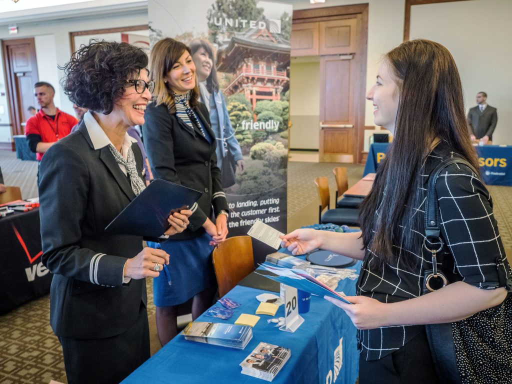 Women-conversing-at-a-Career-Fair