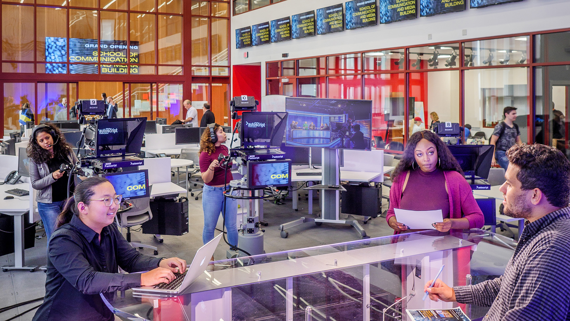 students in news room