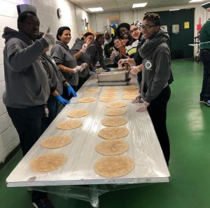 Volunteers preparing food
