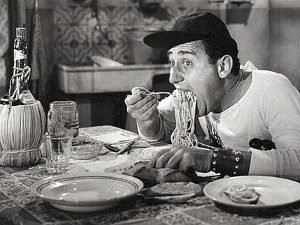 Man eating spaghetti