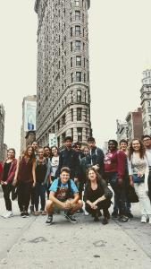 Photo of students in front of the Flatiron building in Manhattan, NY.