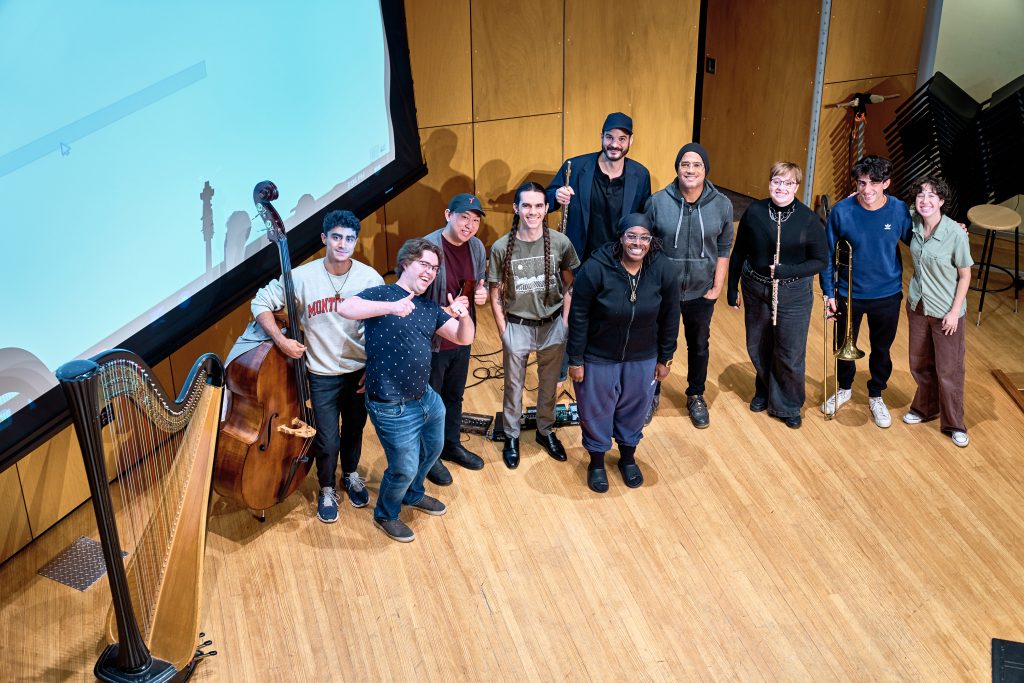 Jlin with masterclass participants on stage in group photo