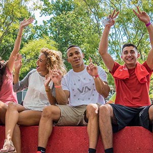 Group of Montclair State University students smiling.