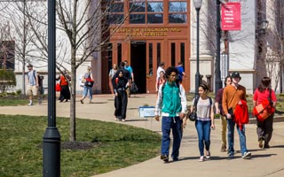 Photo of students walking in front of University Hall