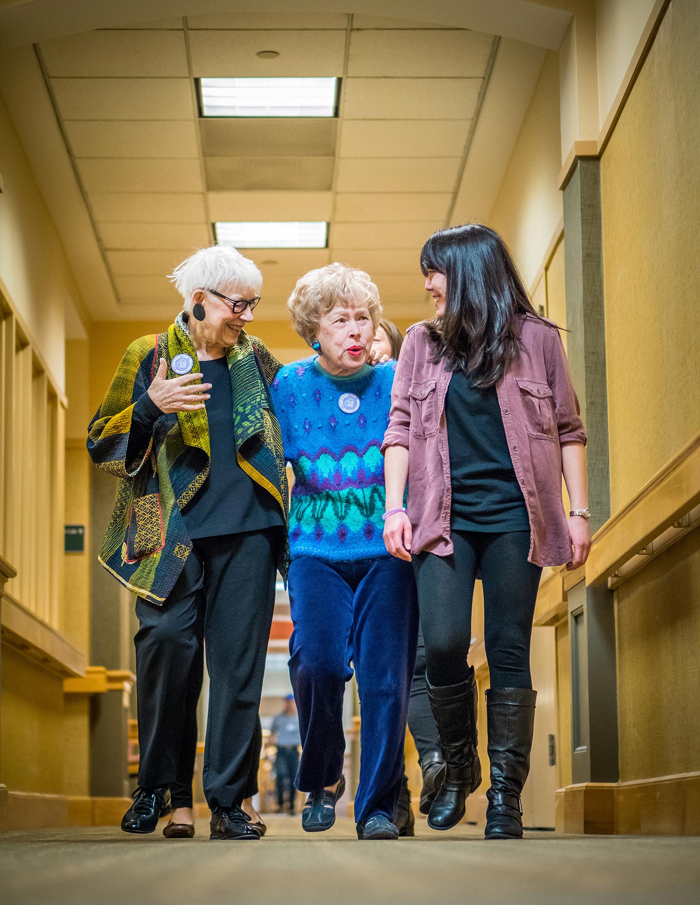 Cedar Crest residents Deborah Greenberg (left) and Nina Romano (center) talk with student Nicole Fischbach ’16.