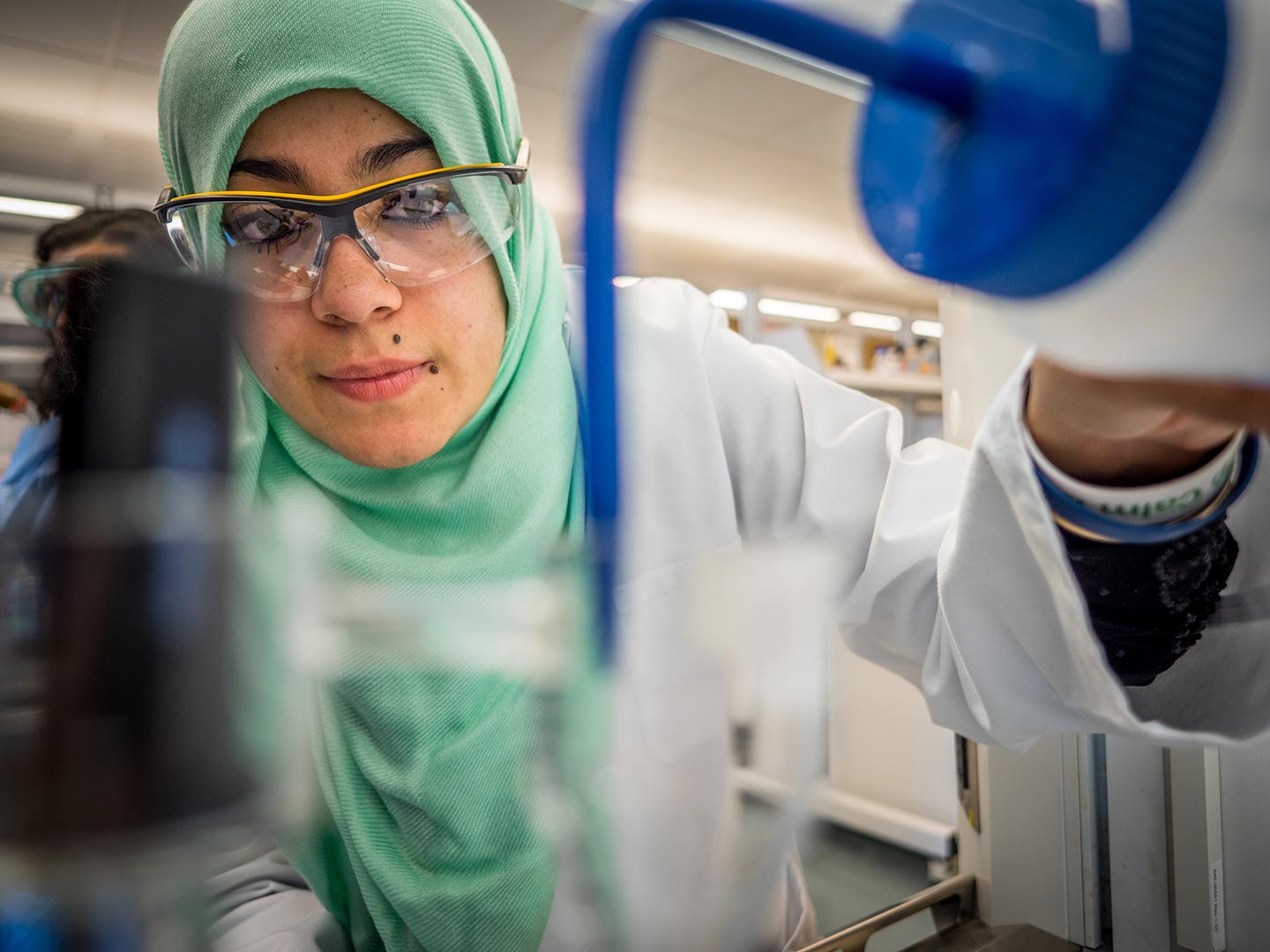 Montclair State University student conducting science experiment in CSAM.