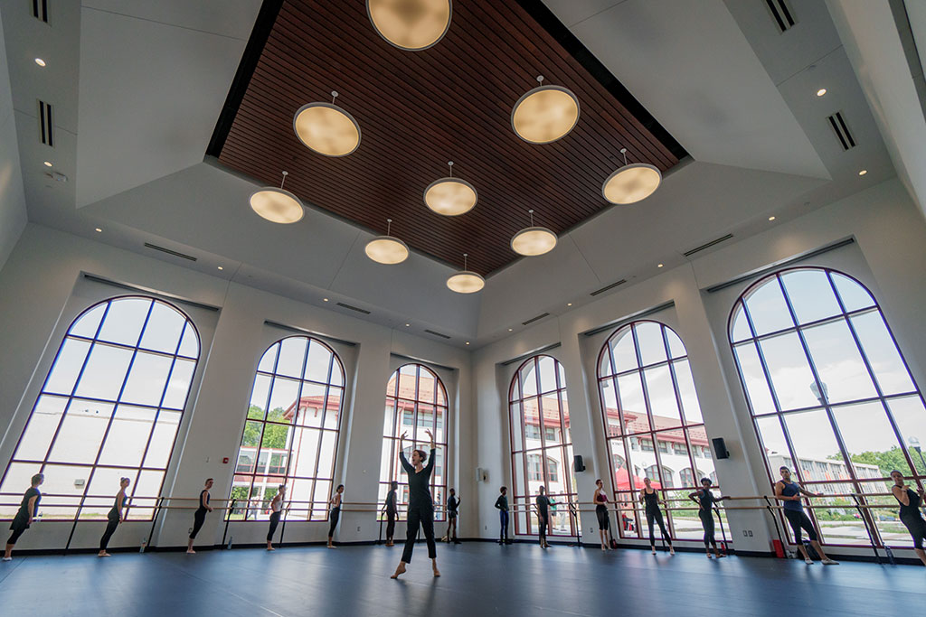 Dance studio in Montclair State University with students dancing.