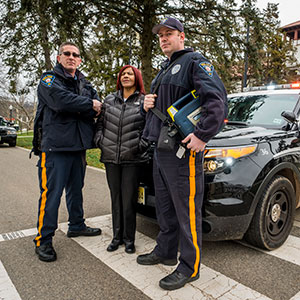 Photo of Officer Jeff Struble, Dispatcher Sylvia Sims and Officer Andrew Burde.