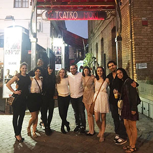 Montclair State students standing in front Teatro Mori.
