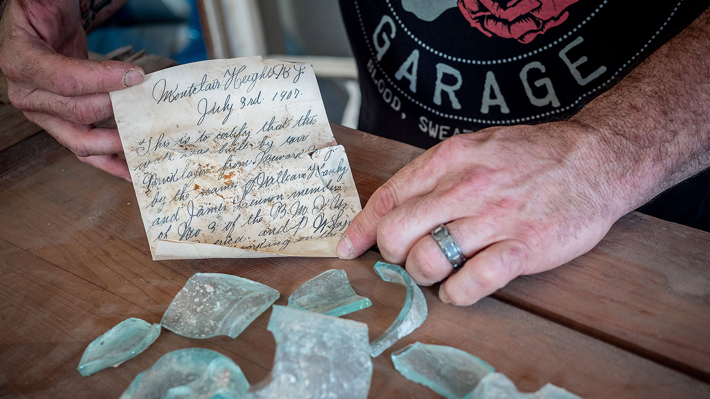 The message and broken bottle were discovered during the renovation of College Hall.