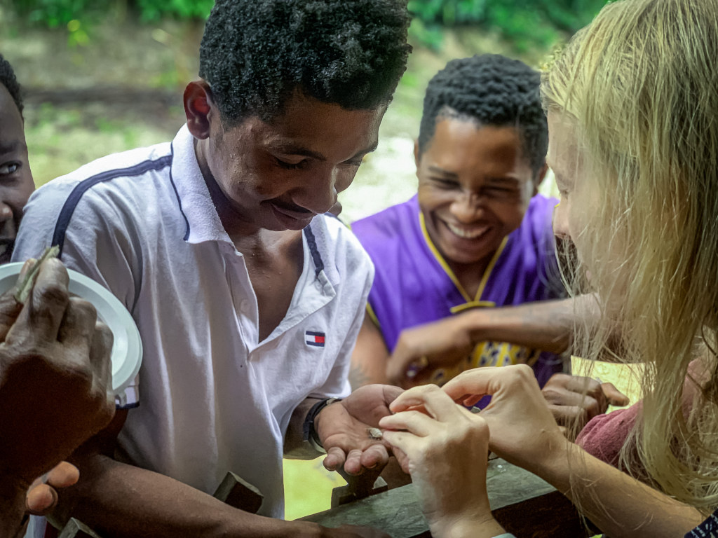 Borgerson shares sakondry aka “bacon bugs” with villagers in Madagascar.