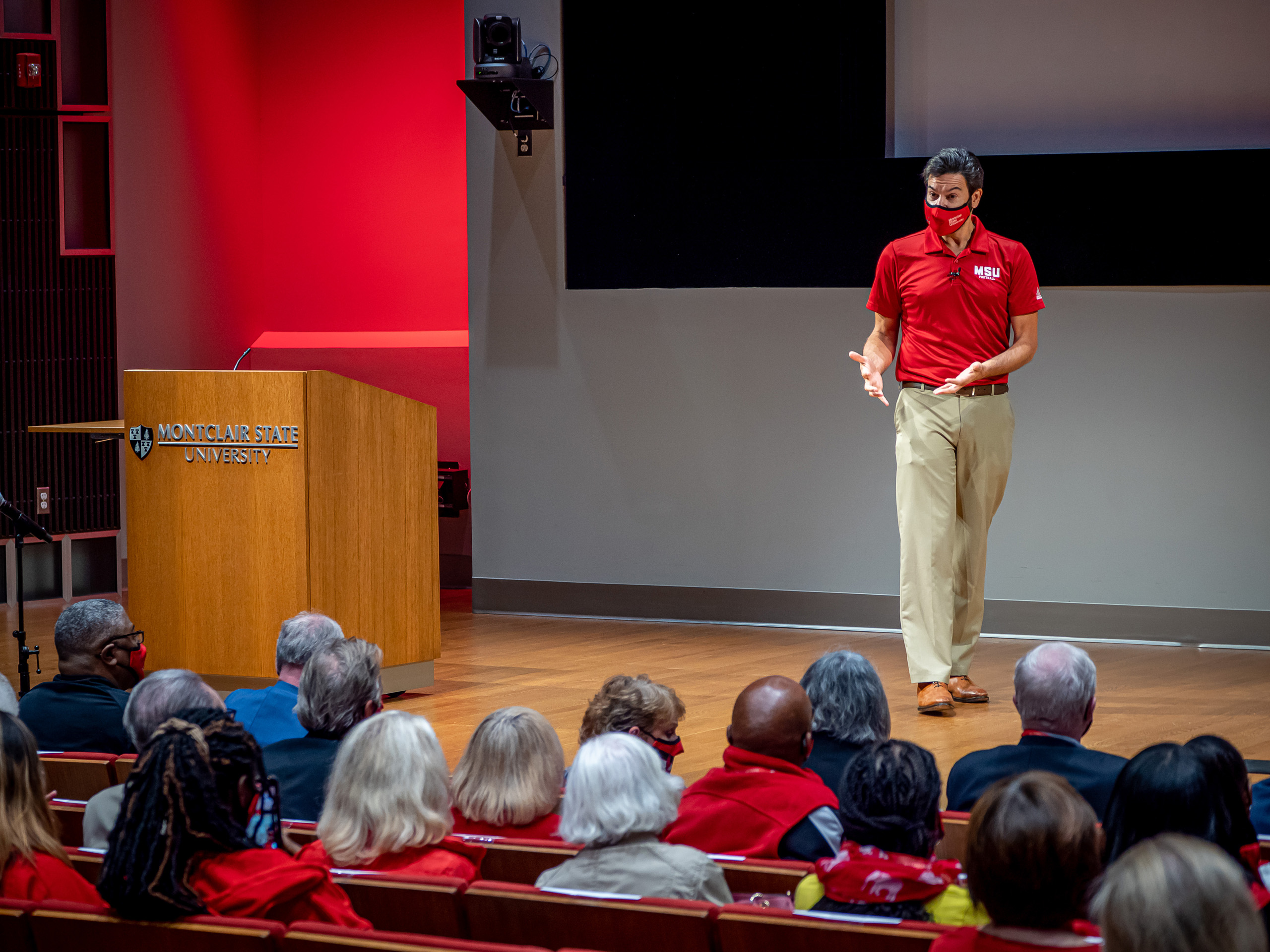 President Koppell on stage giving a speech in the Memorial Auditorium