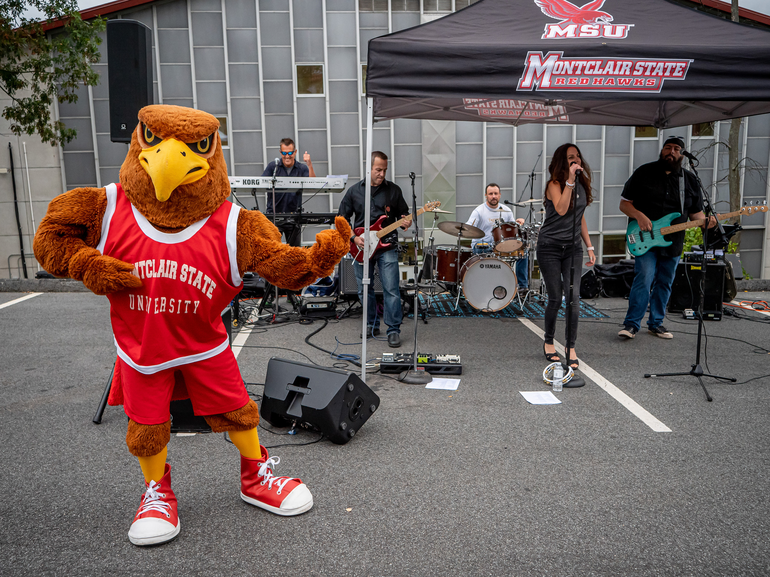 Rocky posing by the live band