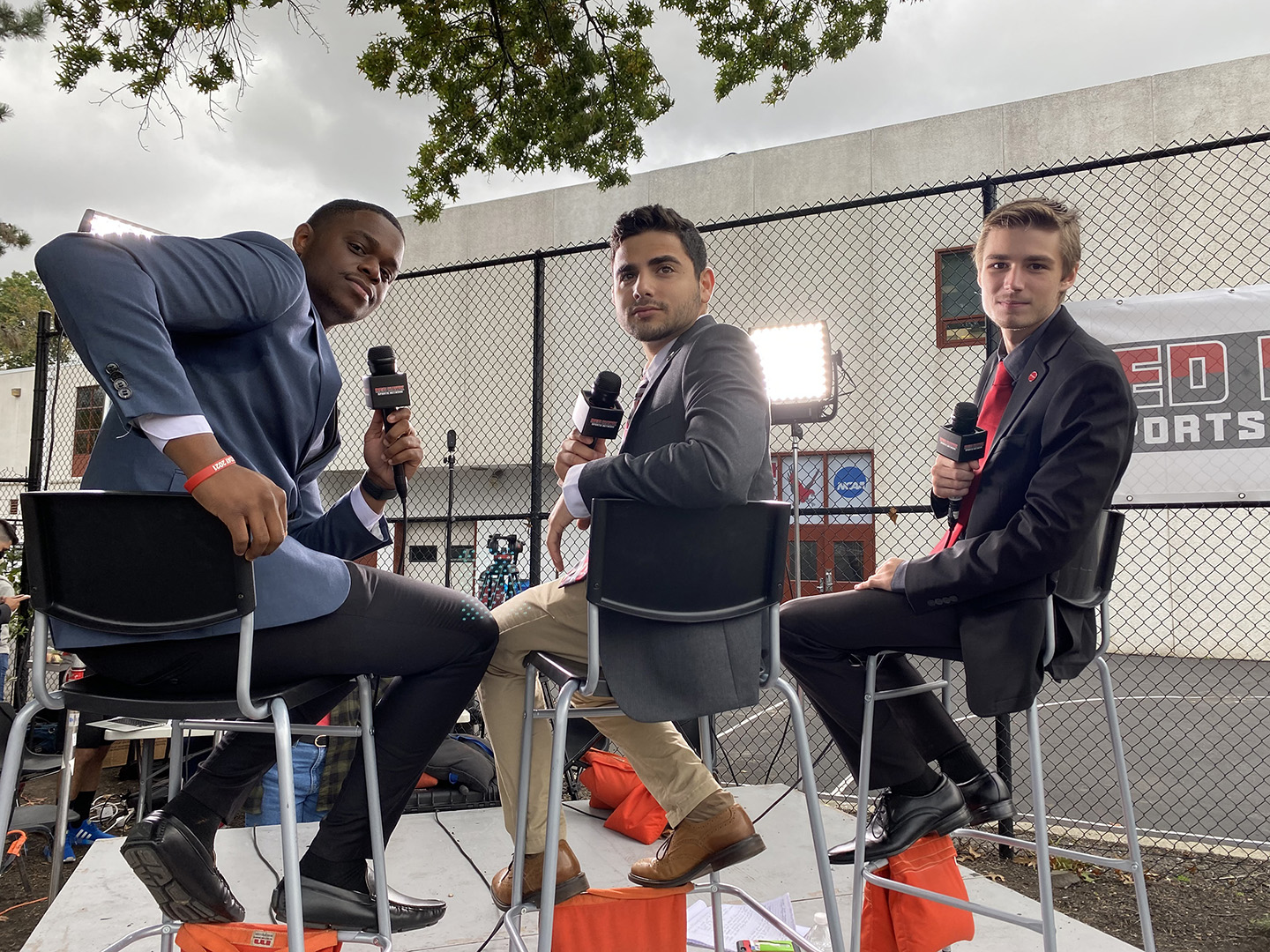 Homecoming broadcast co-hosts (from left) Jonathan Edmond, Jesse Liptzin and Jon Kociban
