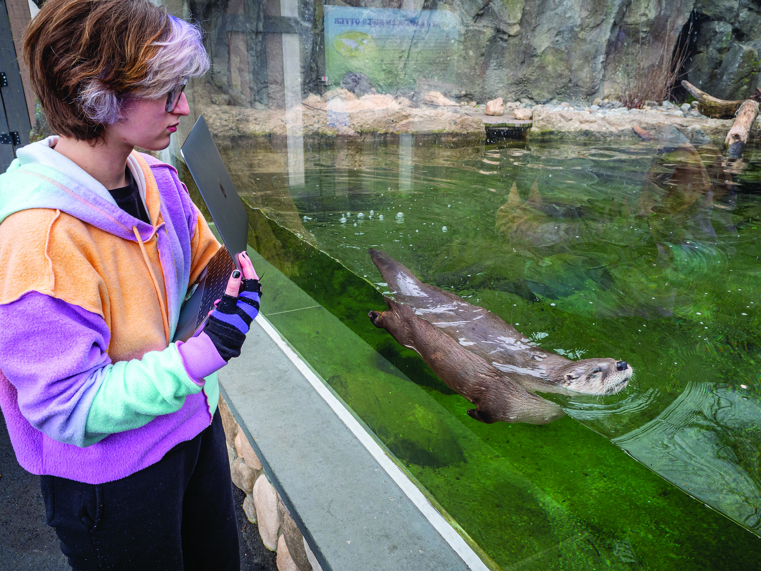 Vanessa Glaser next to an otter tank