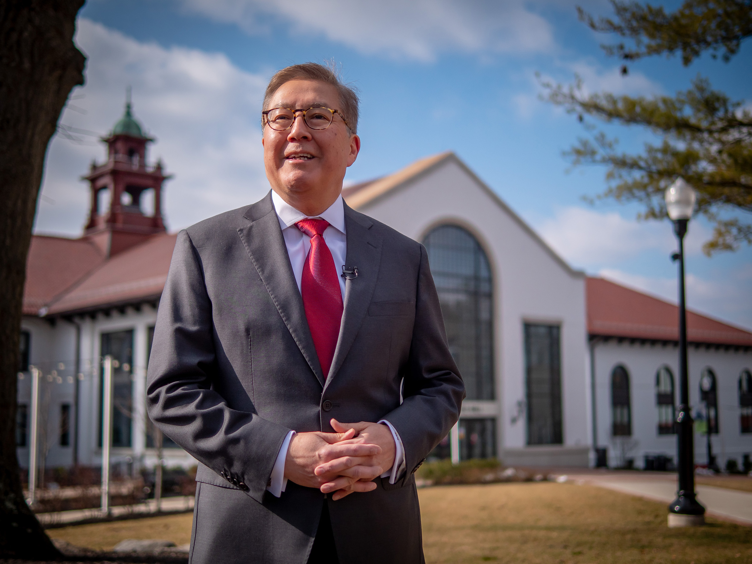 Photo of Montclair State University Provost Junius J. Gonzales in front of Cole Hall