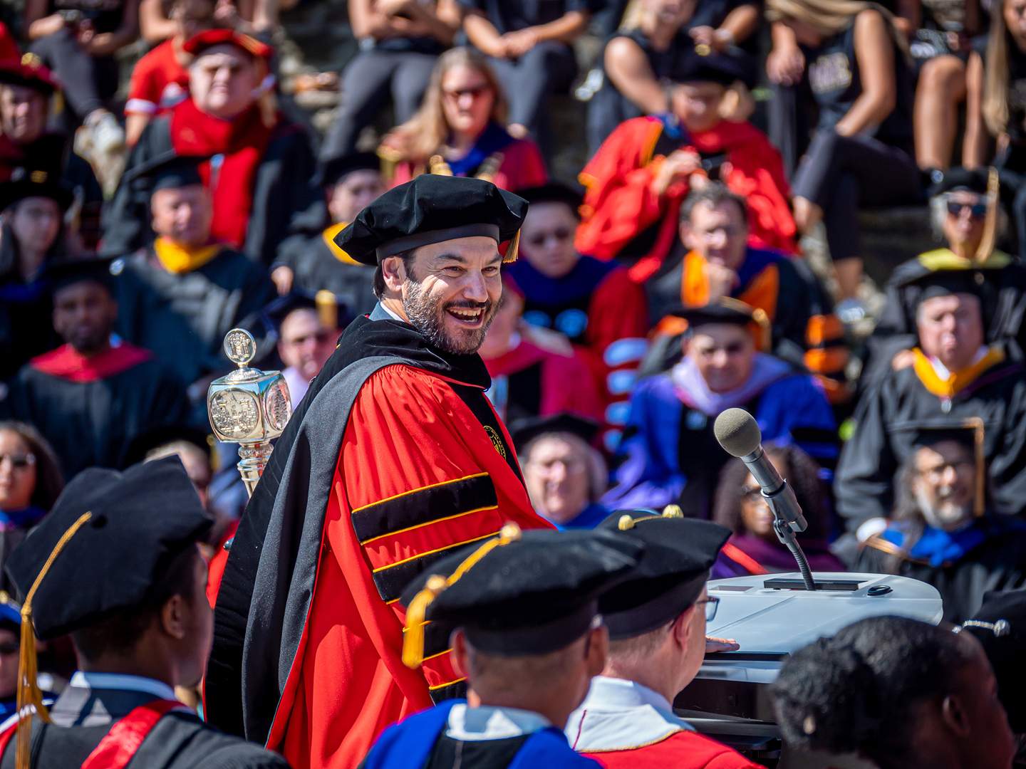 President Koppell smiles at attendees on campus