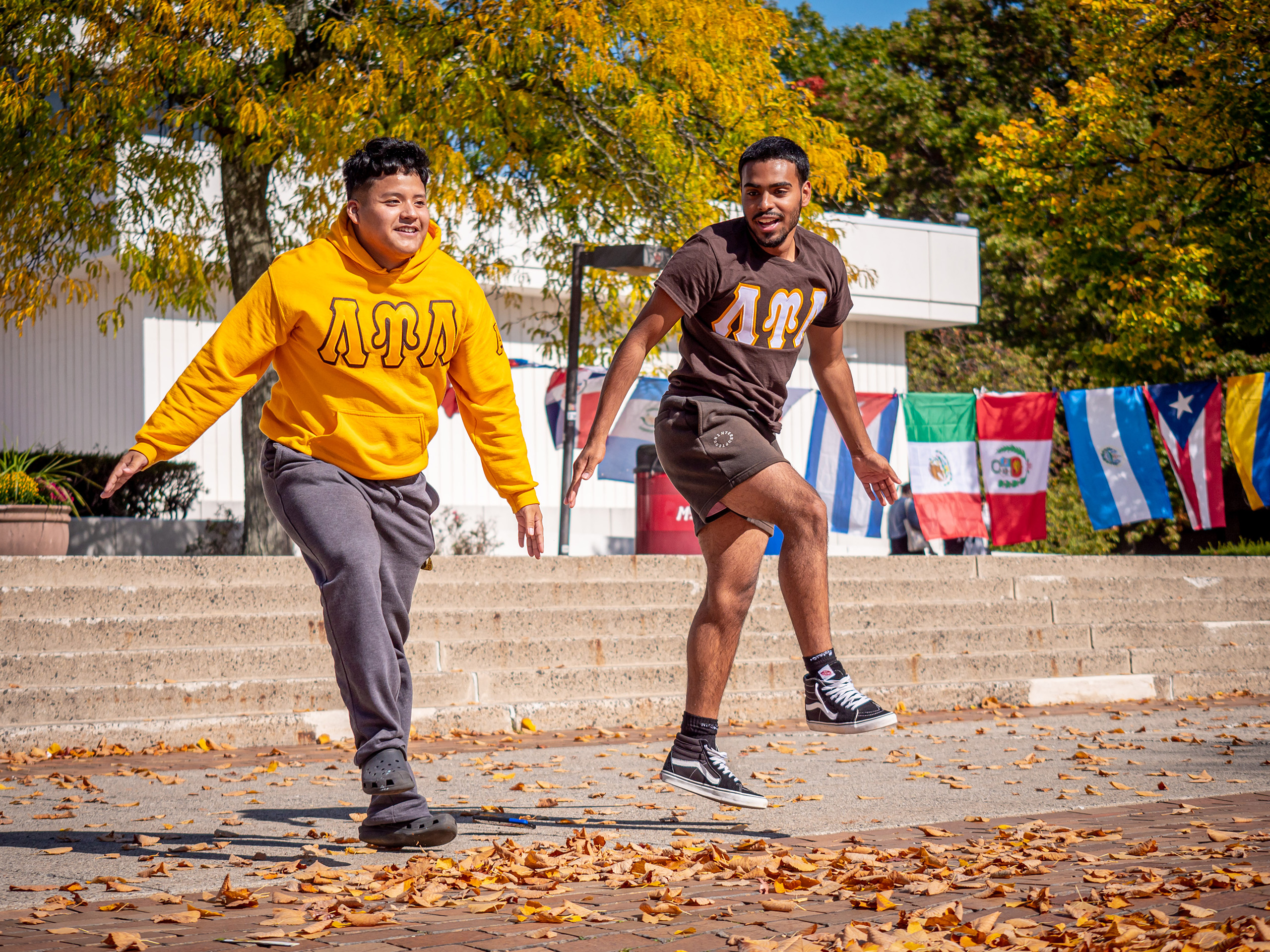 students dancing on campus