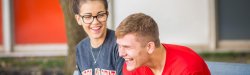 close-up of two students laughing