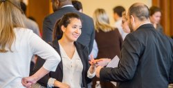 Photo of student speaking with representative at Career Fair.
