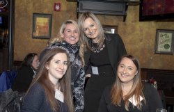 four women at event