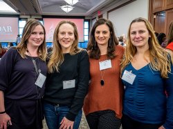 Four female alumni