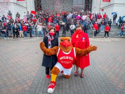 President Cole, Karen Pennington and Rocky the Red Hawk
