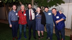 President Koppell poses with alumni