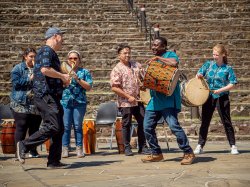 Emmanuel Agbeli with the West African Drumming and Dance Ensemble for the audience