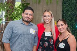 Young alumni at a summer social gathering.
