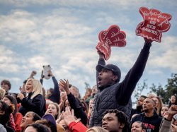 Man cheering at football game