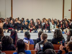 Students watching the runway.