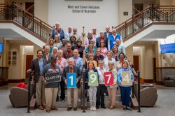 Class of 1974 poses on stairs