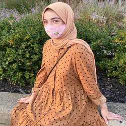 photo of student Lucy Thoroman outdoors wearing a mask