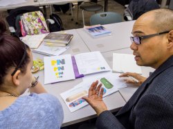 Student and Instructor discussing Visual Communication Design