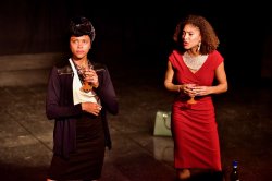 Stage actresses performing a scene