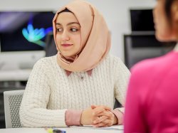 Header image of a student in a classroom