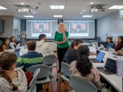 Fashion historian, author and Professor Abby Lillethun leads a discussion on presidential fashion in one of her fashion design classes.