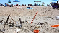 Plastic trash is deposited at the high tide line at Monmouth Beach