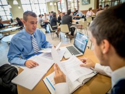 students studying together in common area