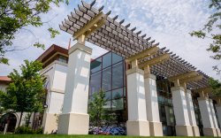 Exterior shot of the Student Recreation Center from the ground up on a sunny day