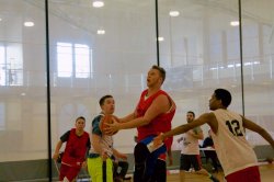 Students playing intramural basketball in the Student Recreation Center.