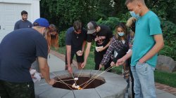 Students roasting marshmallows