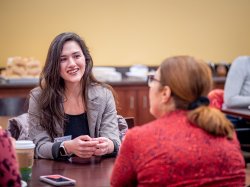 student and employer sitting at table