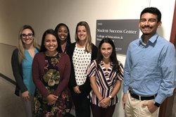 Staff in hallway in front of student success center