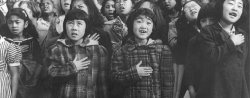 young children with hands over hearts