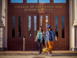 Photo of students in front of University Hall.