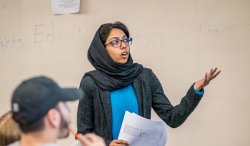 Woman lecturing in classroom