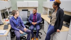 Clinic staff hanging around having a conversation