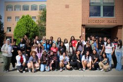 NextGen Fall Orientation group photo in front of building.